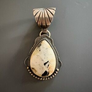 Elegant Silver and Cream Pendant